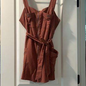 Orange romper brand new